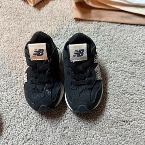 New Balance Kids Black and White Sneakers